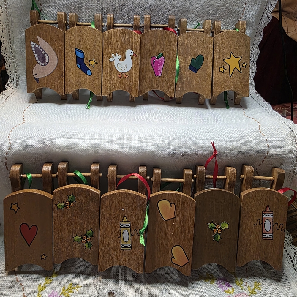 12 Hand Made Wood Sled Christmas Ornaments With Various Themes
